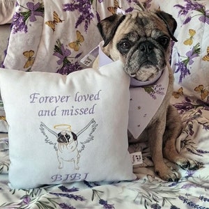 A decorative pillow in memory of a pug that crossed the Rainbow Bridge . Made of nautical canvas, with a beautifully embroidered Angel pug.