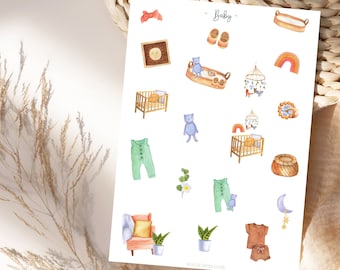 May include: Watercolor illustrations of baby-themed items on a white background. The images include a crib, teddy bears, a rainbow, baby clothes, and a chair. The word "Baby" is written in green script at the top. The bottom right corner has the text "MAGICMOMAGER".