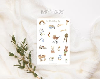 May include: A sheet of watercolor baby stickers with various illustrations, including a rainbow, camera, stroller, and toys. The text "BABY STICKERS" is at the top. The stickers are in soft pastel colors.