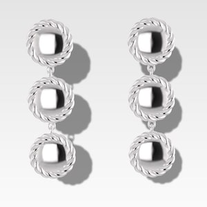 May include: Silver dangle earrings with three round, textured, silver discs.