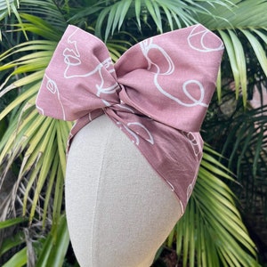 Pink Linen Wired Headband with Abstract Faces | Easy & Versatile Wire Head Wrap