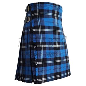 Side profile of Ramsay Blue kilt featuring a silver thistle kilt pin and adjustable black leather waist straps for a custom fit.