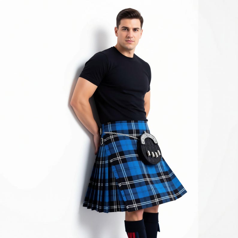 Rust-free silver buckles on a personalized Ramsay kilt, traditionally worn with a Sgian Dubh tucked into the kilt hose.