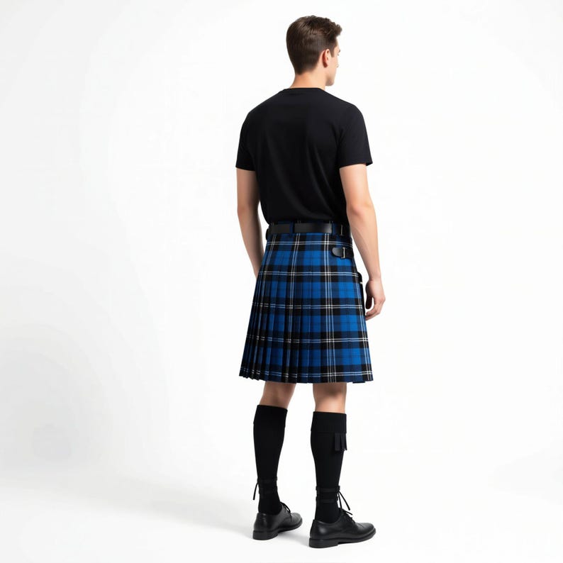 Rear angle of an 8-yard Ramsay Blue kilt, displaying perfectly symmetry tartan pleats that provide a professional swing.