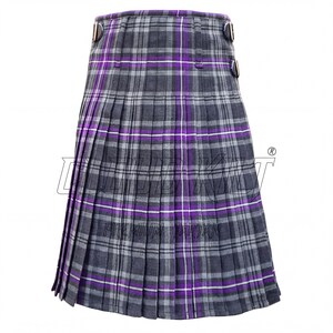 A gray and purple plaid kilt with two buttons on the waistband.