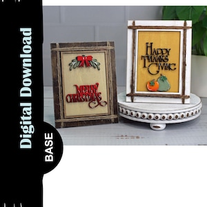 May include: Two wooden signs with a rustic frame and twine accents. The sign on the left says "Merry Christmas" in red letters with a red bow and green leaves. The sign on the right says "Happy Thanksgiving" in black letters with a yellow pumpkin and green pear.