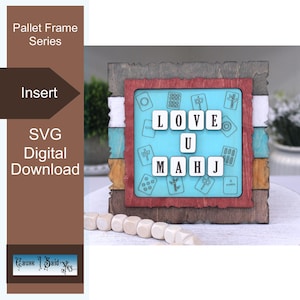 May include: A wooden pallet frame with a turquoise insert that reads "LOVE U MAHJ" in white letters. The frame has a red border and is surrounded by layers of wood in various colors. The words "Pallet Frame Series", "Insert", and "SVG Digital Download" are also visible.