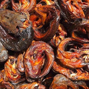 large Nigerian round whole smoked catfish rings tasty spiced and smoked dried fish 4pcs
