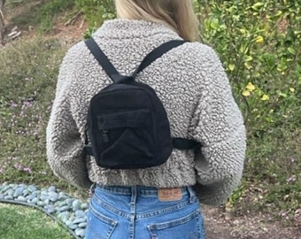 little black backpacks