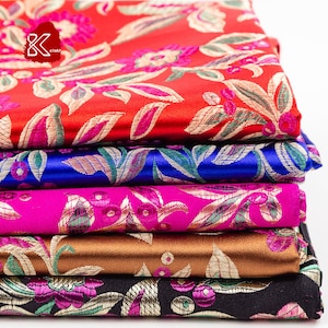 Tessuto broccato cinese con foglie e fiori / Prezzo al metro intero 9,99 / Larghezza 35" / Tessuto cinese in 5 colori: rosso, blu reale, bronzo, rosa.