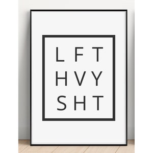 May include: Black and white printable wall art with the text "LFT HVY SHT" inside a square frame.