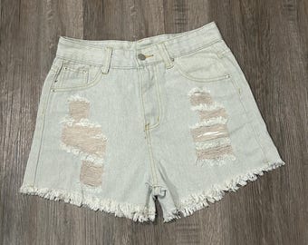 Blue Southern Belle 90s Style High-Waist Acid Washed Distressed Ripped Hem High Waisted Tassel Denim Cutoff Shorts with Pockets
