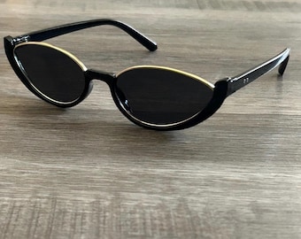 Occhiali da sole a forma di occhio di gatto, stile retrò, neri e grigi, stile Y2k, alla moda, casual, classici e retrò.