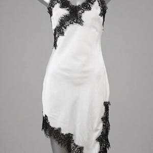 white lace dress with black trim White Satin Mini Dress Black Lace Sleeves