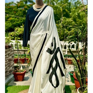 Off white saree with black border and hand painted maa on it paired with a black stitched blouse/ indian designer wedding sari/ casual saree