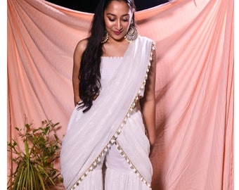 Off white rushing tube top paired with shimmery sharara pants saree indo western Indian wedding bridesmaids wear/ cocktail dress/ fusion wea