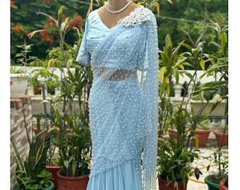 Sky blue pearl embellished engagement cocktail stitched saree with a satin pleated blouse, indo western saree gown