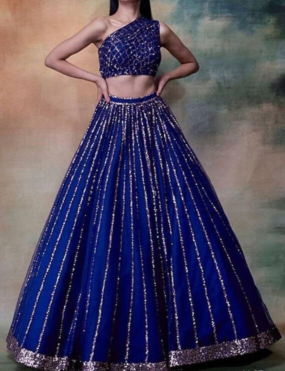 Electric blue sequins embroidered cocktail lehenga with one shoulder blouse - Main Image