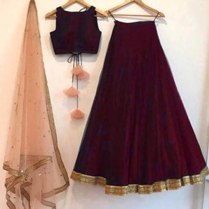 Burgundy silk bridesmaid wedding lehenga and blouse with contrast peach embroidered dupatta