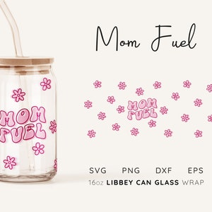 May include: A clear glass 16oz Libbey can with a pink and white "Mom Fuel" design and pink flowers. The can has a wooden lid and a straw. SVG, PNG, DXF, and EPS files are included.
