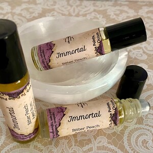 IMMORTAL Roll On Perfume Oil - 10 ml, Peche de Vigne, Amber Musk, Patchouli, Vanilla Bean, Blood Orange image 1