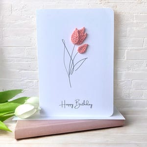 Scheda con motivo estetico all'uncinetto: tulipani