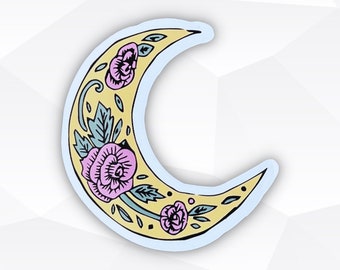 May include: A crescent moon sticker featuring a pale yellow background with black outlines. The design includes three pink roses with green leaves and stems arranged along the curve of the moon, finished with a light blue border outline.