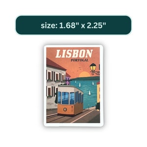 May include: A vintage-style postcard featuring a yellow tram traveling up a hill in Lisbon, Portugal. The postcard has a blue and green background with a sunset and boats in the water. The text "LISBON PORTUGAL" is printed in white on the postcard.