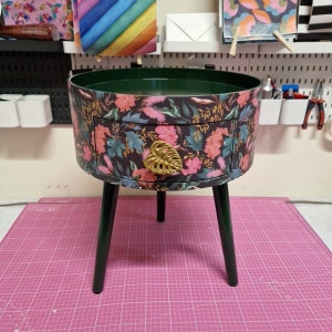 Pink and charcoal grey nightstand,  floral green  round side table with leaf and flower design. Inbuilt drawer  with gold
