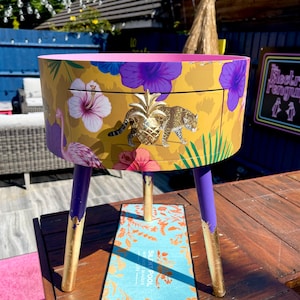 Round living room table with drawer. Ideal Nightstand or end table. Yellow tropical design with pink top, purple legs and gold leaf