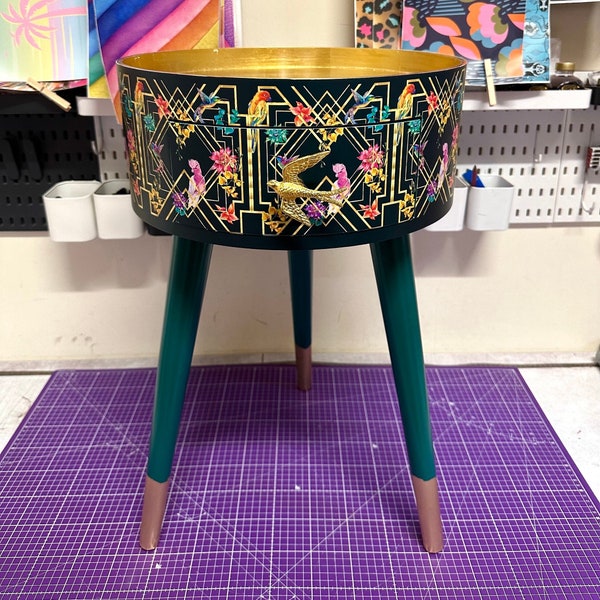 Art deco bed side table, emerald green, gold and pink bird design. Bedroom nightstand, colourful bedside end table. Taller legs with drawer