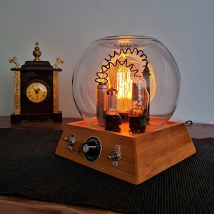 Vintage steampunk style old electronics parts triode vacuum tube edison table lamp
