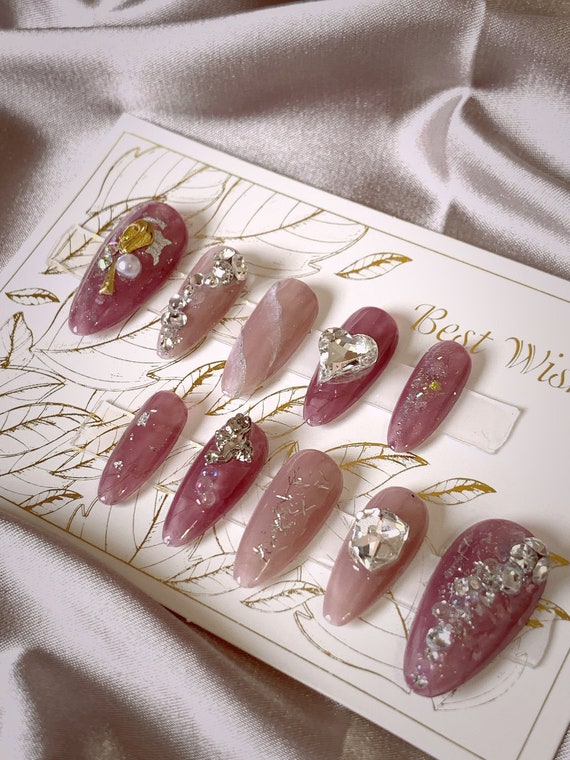 Fall press on nails designed with authentic swarovski crystals
