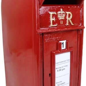 May include: A red vintage-style mailbox with a gold crown and the letters "ER" on the front. The mailbox has a slot for mail and a small window with a sign that says "Last Collection Time" and lists the collection times for Monday to Friday and Saturday.