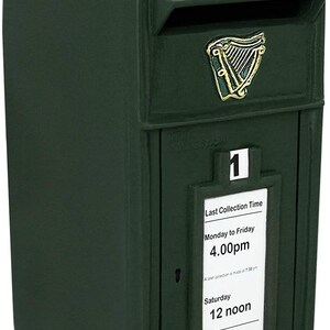 May include: A green metal mailbox with a gold inscription that reads "POST OFFICE". The mailbox has a slot for mail and a small window with a sign that reads "Last Collection Time" and lists the collection times for Monday to Friday and Saturday.