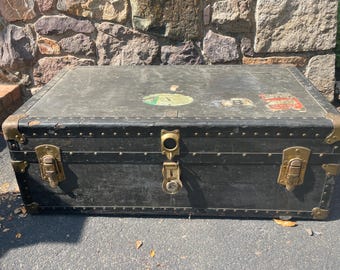 Antique Black Steamer Trunk: Brass Hardware, Worn Ship Stickers
