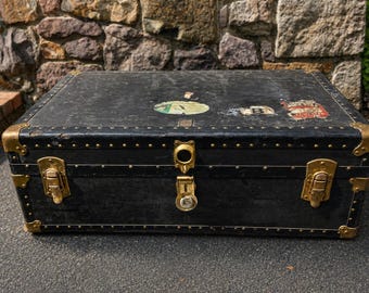Antique Black Steamer Trunk: Brass Hardware, Worn Ship Stickers
