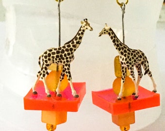 Pink, orange, and giraffes? Artful earrings, colorful and unique earrings.  Modern jewelry