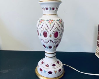 Antique BOHEMIAN CZECH VASE Cased cut to cranberry glass.White overlay.Hand Painted Roses with Gold trim Floral design.Cut top edges. Antique BOHEMIAN CZECH VASE Cased cut to cranberry glass.White overlay.Hand Painted Roses with Gold trim Floral design.Cut top edges.