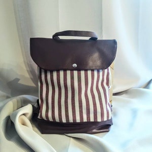 Small backpack with matching cosmetic bag