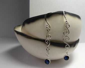 Blue paua shell scroll earrings