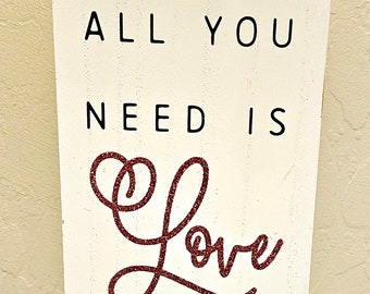 Valentines you need is love, sign, placard. decorate  for Valentine's Day  or other special occasion