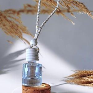 Difusor/ambientador para coche, botella de vidrio recargable, muy perfumado.