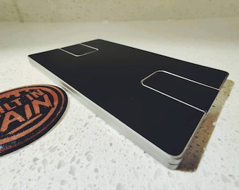 Funda protectora CryptoTag con frase de Zeus y Thor (en blanco o con símbolo) - Color a elegir - Envío gratuito