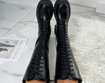 Black chunky lace up boots knee length