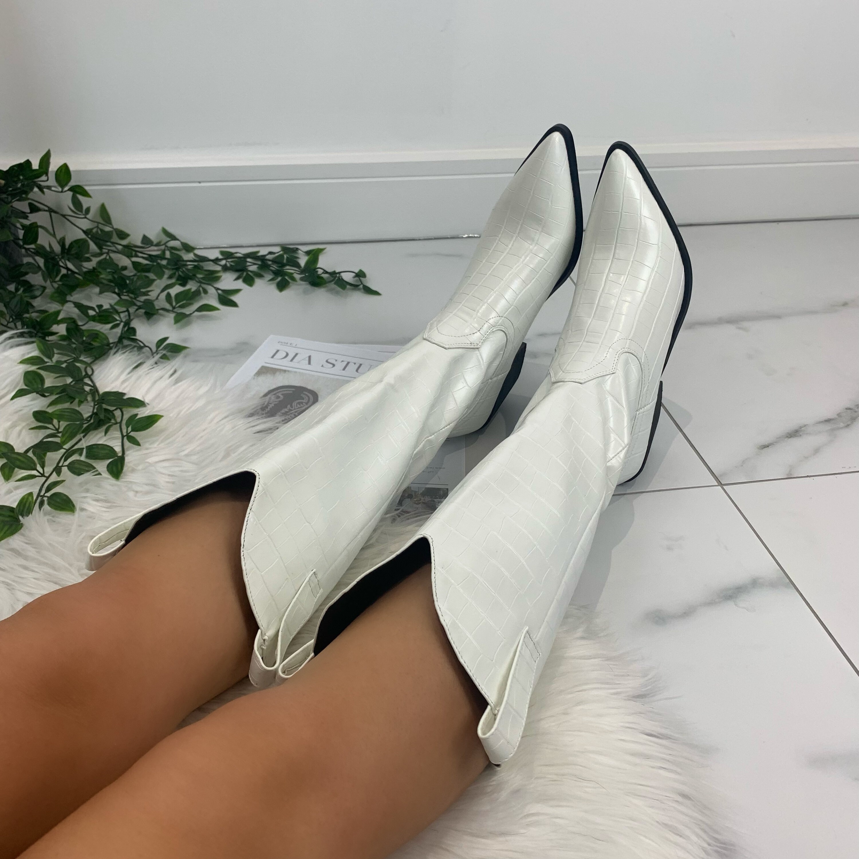 White store slouch booties