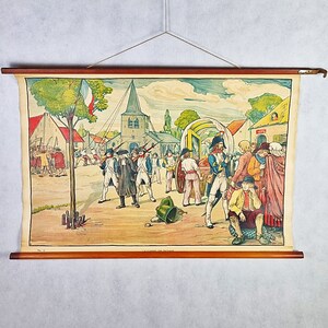 May include: A vintage educational poster depicting a scene from the French Revolution. The poster features a group of people in 18th-century clothing, including a man in a military uniform, standing in front of a church. The poster is titled "La Guerre des Paysans" and has the number "No. 12" in the bottom left corner.