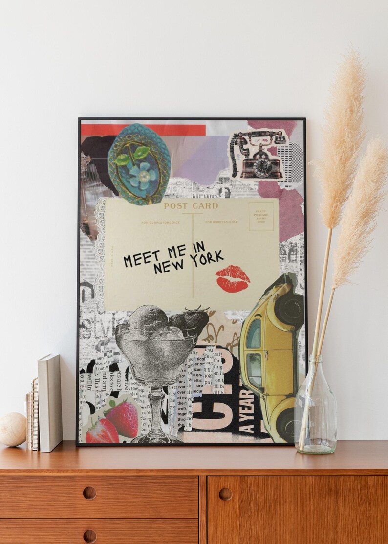 May include: A framed collage print featuring a vintage postcard with the text "MEET ME IN NEW YORK", a red kiss mark, and a yellow car. Other elements include a sundae, strawberries, and a vintage telephone.