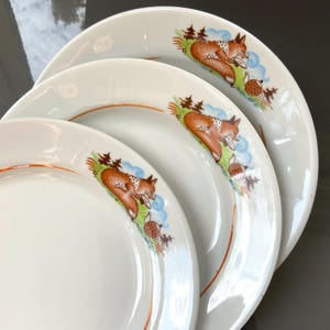 The price is for one plate. Vintage children&#39;s dish featuring a fox drinking tea – inspired by fairy tales.