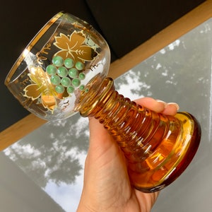 A Roemer vintage wine glass 200ml Arcoroc France stemmed Amber color glass, Gold trimmed